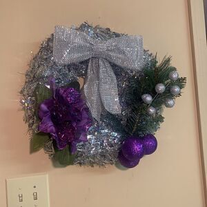 Silver and purple wreath. Inv 243